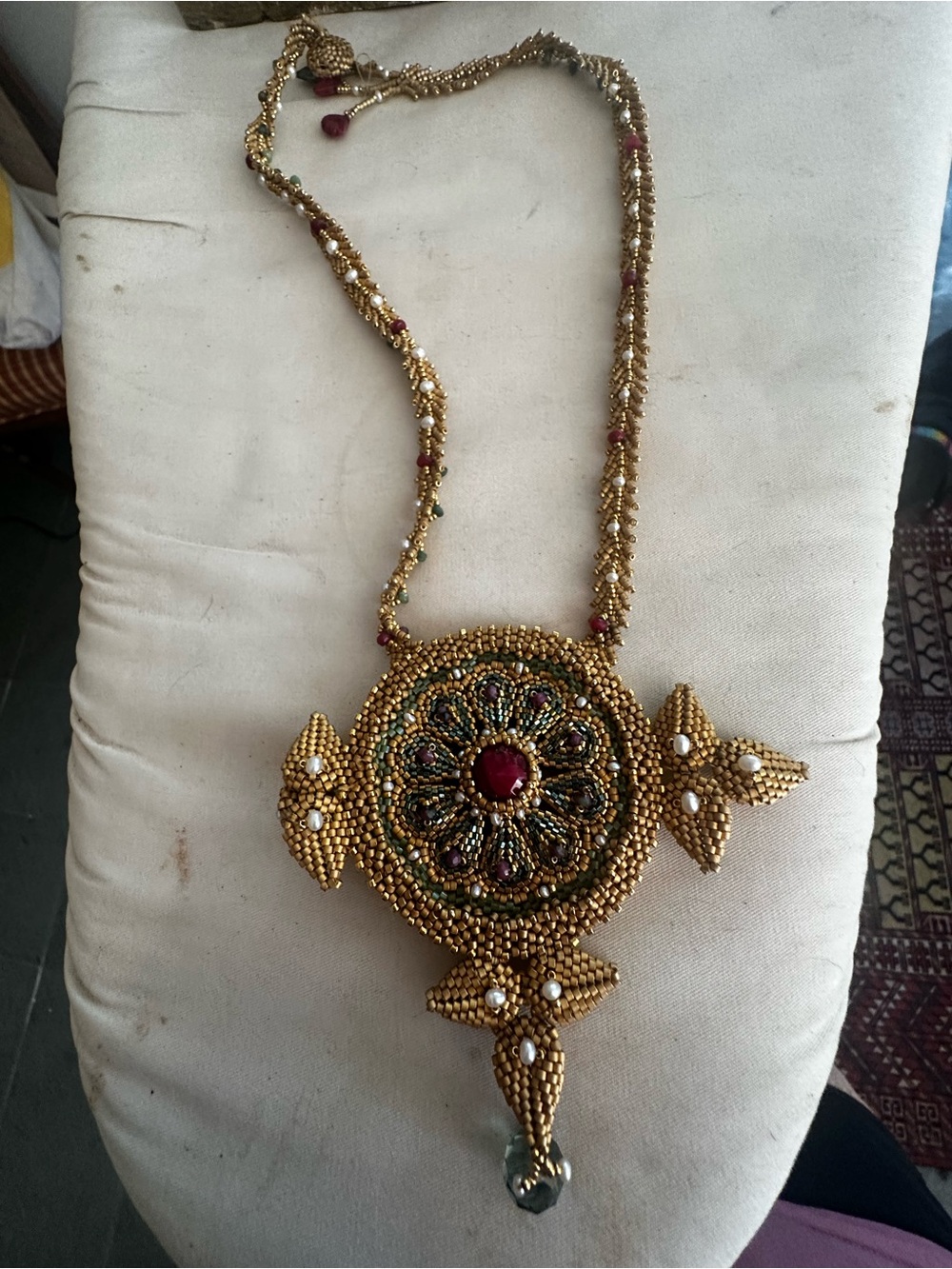 Gold-Tone Beaded Pendant Necklace with Ruby Accent